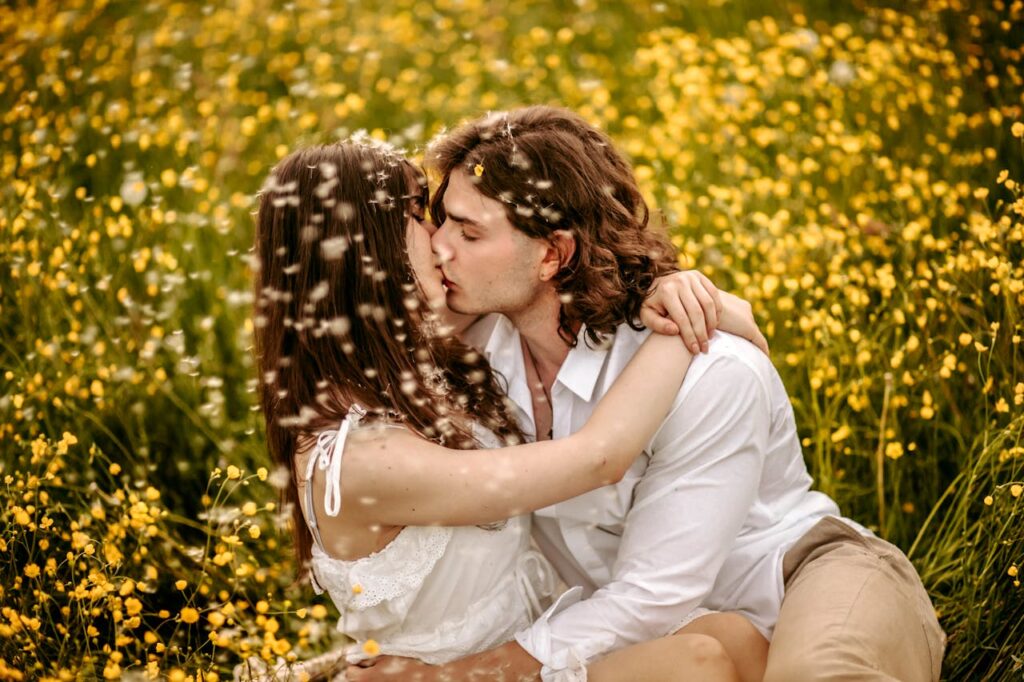 Couple Kissing and Hugging on Meadow