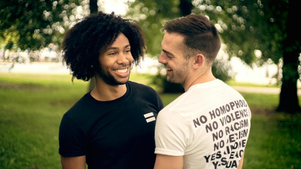 Photo of Men Wearing T-Shirts